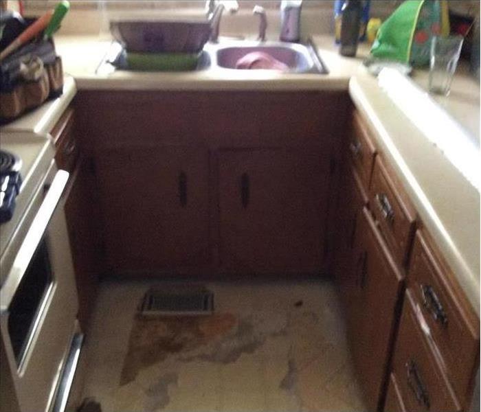 Kitchen with storm damage