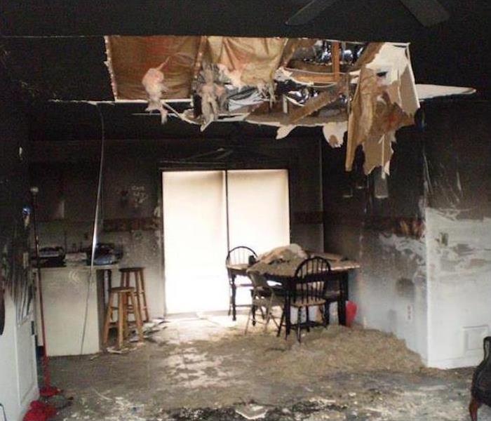 Kitchen with severe damage