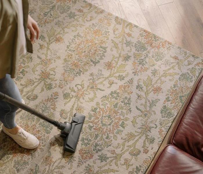 Photo by cottonbro from Pexels - someone cleaning carpet